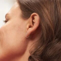 Moonstone Navette Floating Huggie Hoop Earrings - Single | 14k Gold -STILNEST Jewelry Sales FloatingNavette 01 f5549a52 e20f 4910 8fab 263b4c7c277d