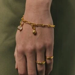 Victoria Bracelet -STILNEST Jewelry Sales Twisted Egg Charm 02 ac6c072e d435 4cea a6bc 23cf9d17ebe6